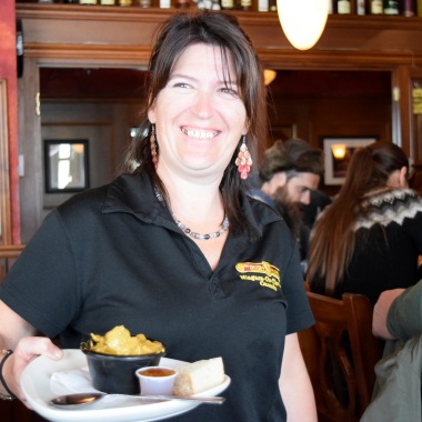 Sandy from Irish Harp Pub always has a smile on her face.